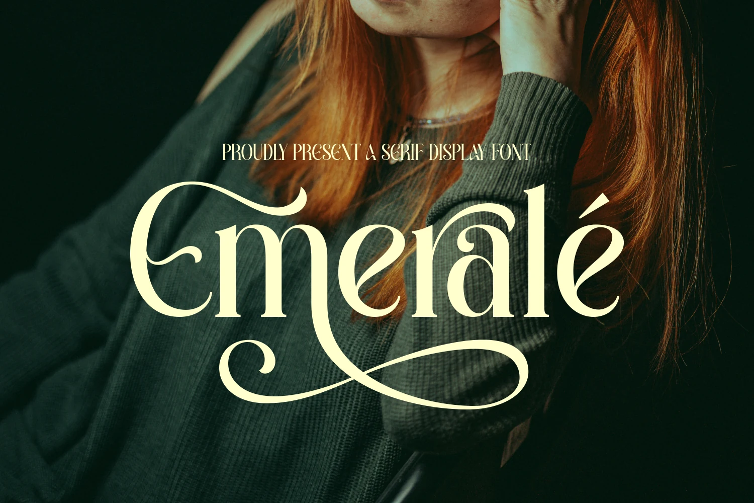Emerale Font preview with ornamental serif lettering, high-contrast strokes, and sweeping flourishes