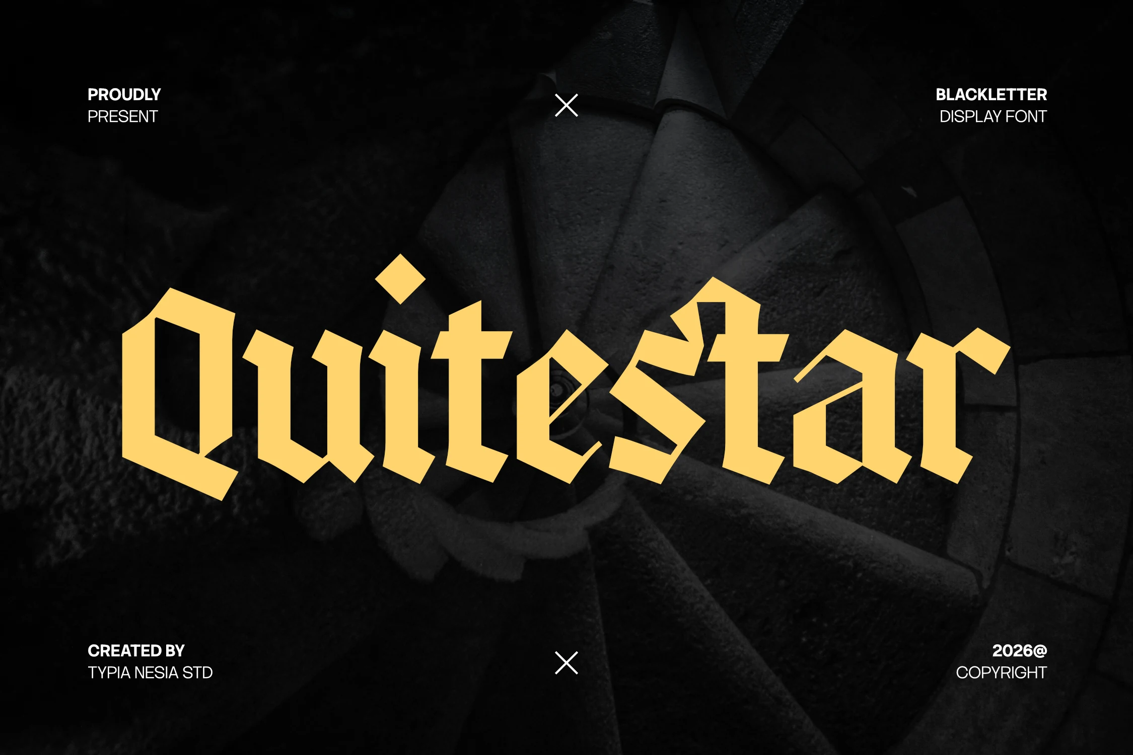 Quitestar Font preview with bold angular blackletter lettering in warm yellow and a modern gothic style