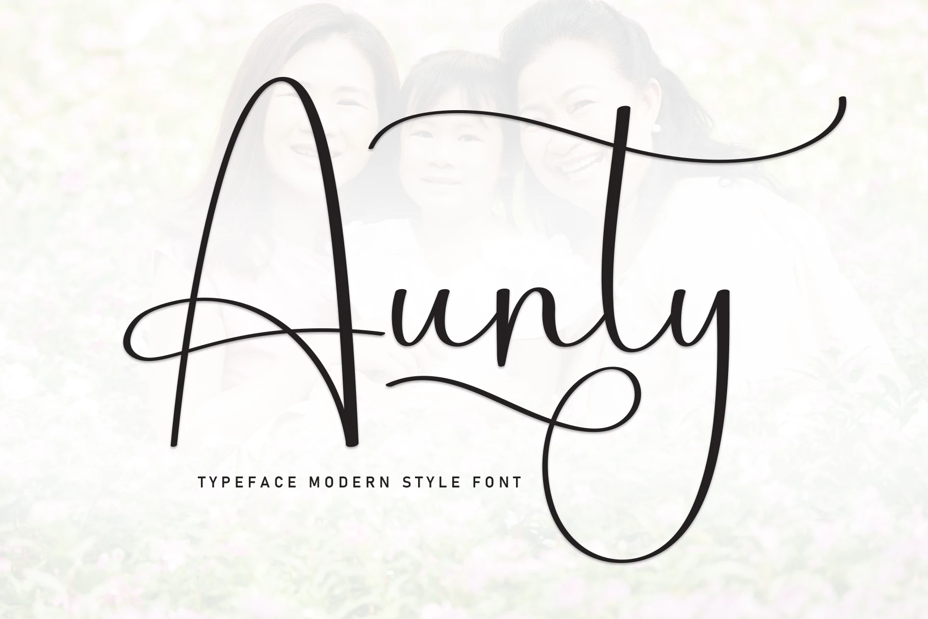 Aunty Font thin black monoline script with an oversized flourished A and looping y