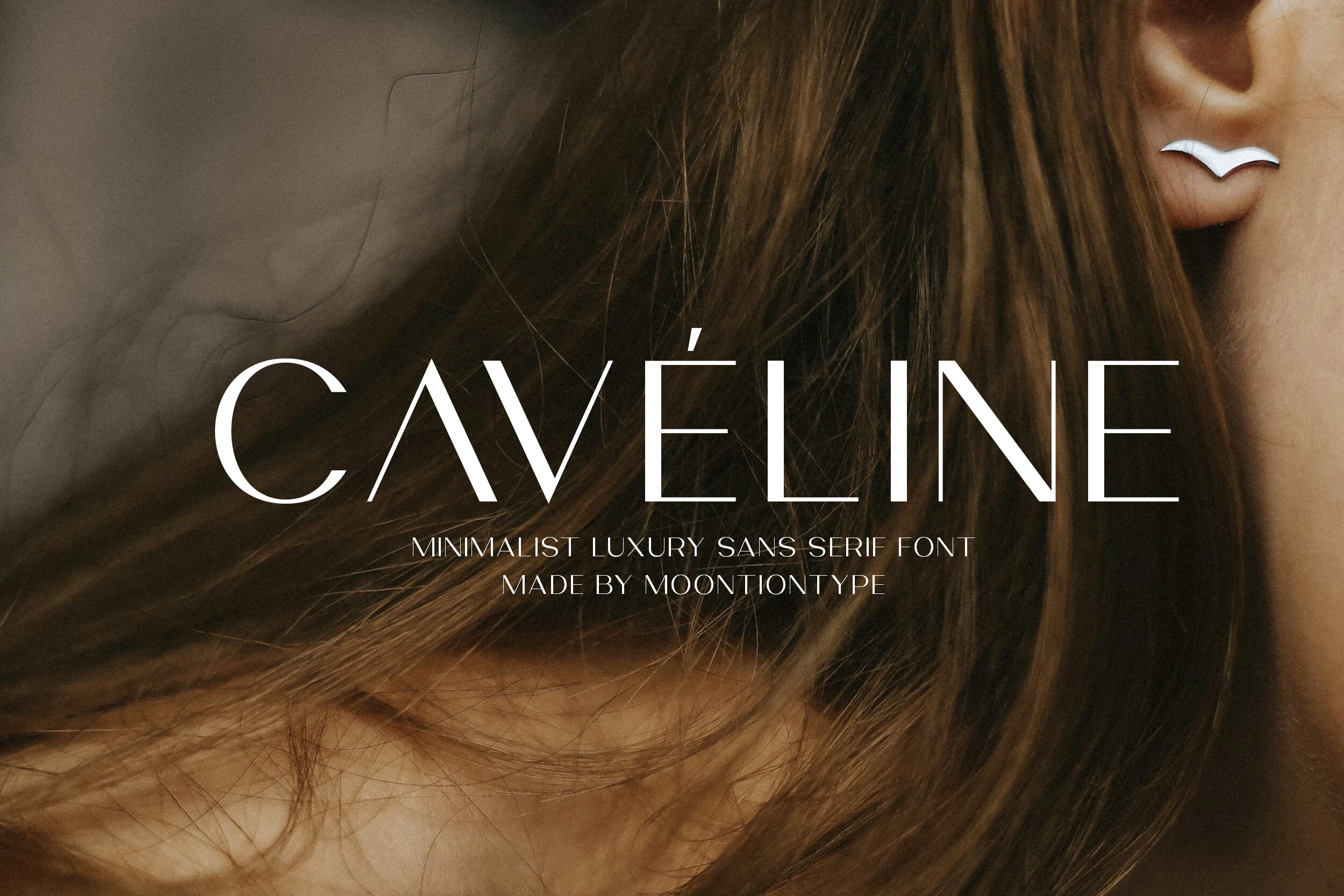 Caveline Font preview with thin white minimalist sans serif lettering and an accented É
