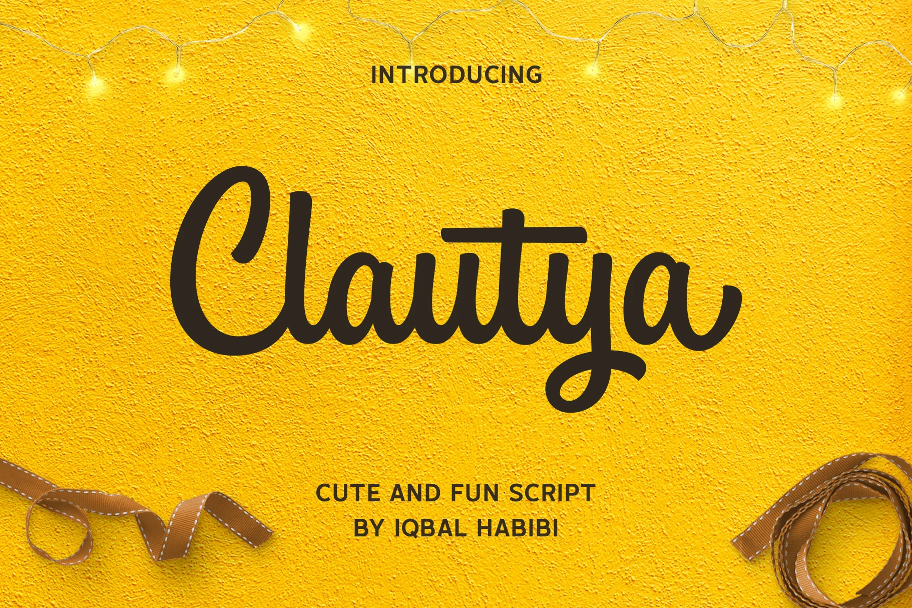 Clautya Font preview with bold dark handwritten script, rounded strokes, and a looped y descender