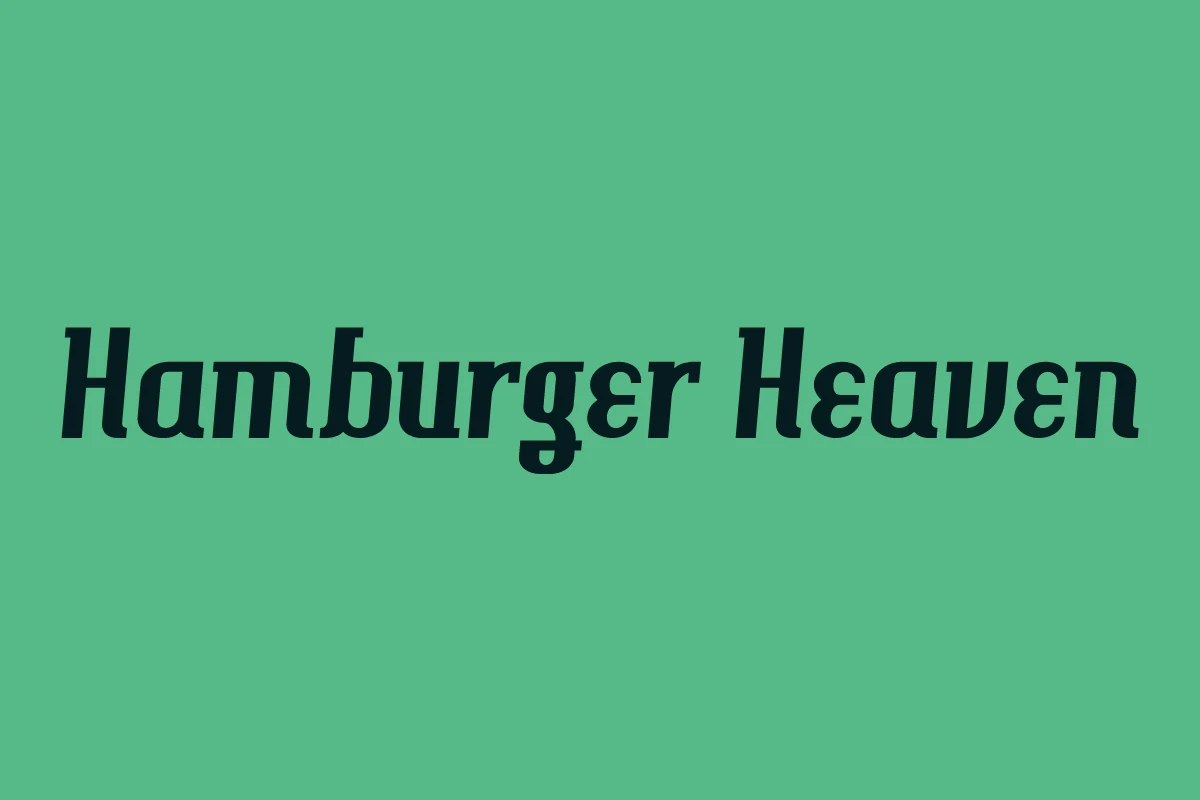 Hamburger Heaven Font vintage italic serif preview with heavy dark letterforms