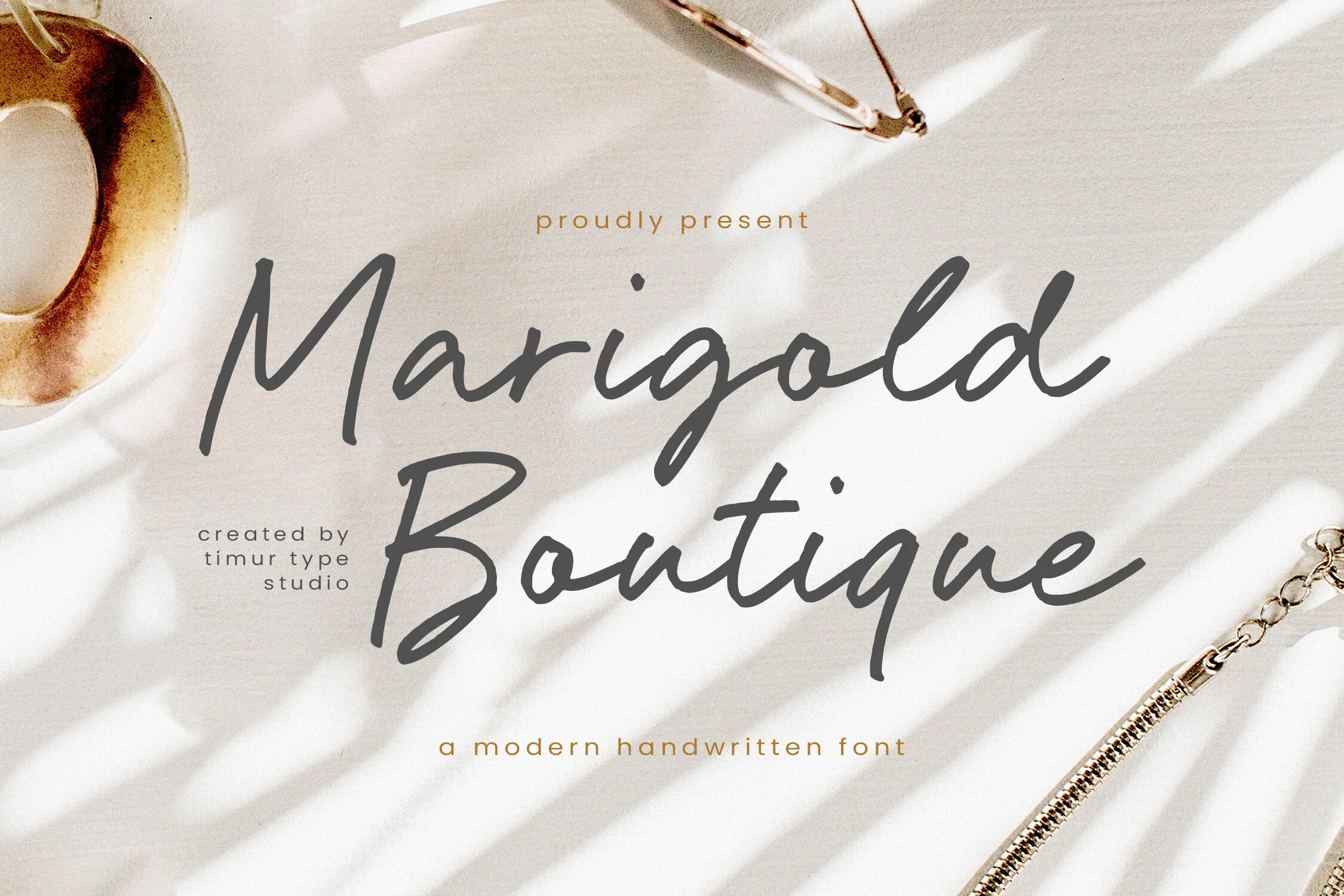 Marigold Boutique Font preview with dark gray modern handwritten script and loose brush strokes