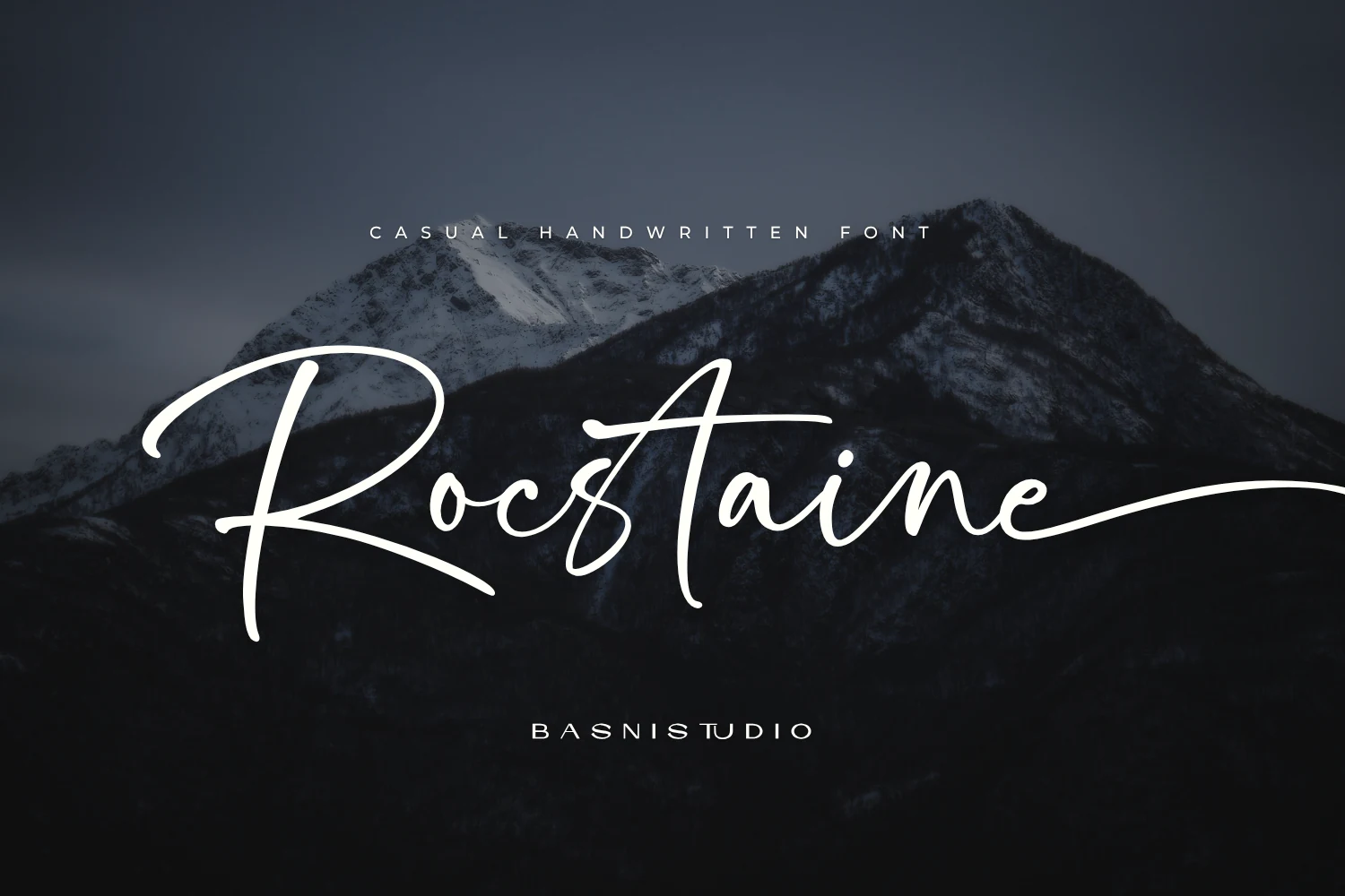 Rocstaine Handwritten Font white casual signature script preview with long sweeping strokes