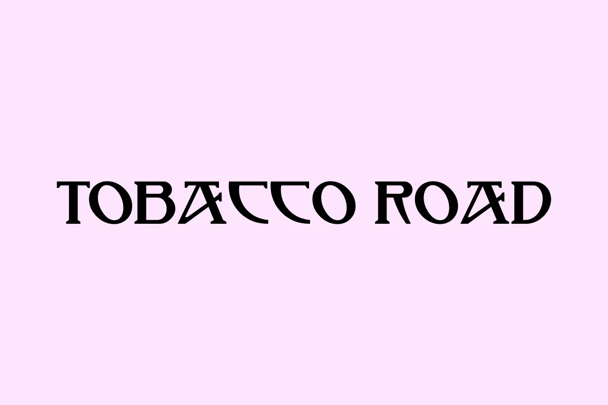 Tobacco Road Font black retro serif lettering with angular cutouts and bold vintage shapes