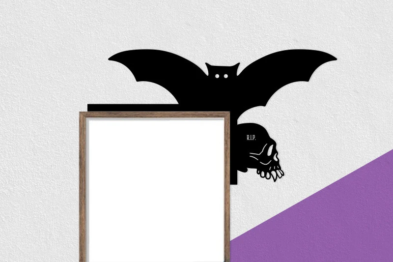Laser Cut Halloween Door Corner SVG featuring a solid black flying bat above a skull with R.I.P. text.