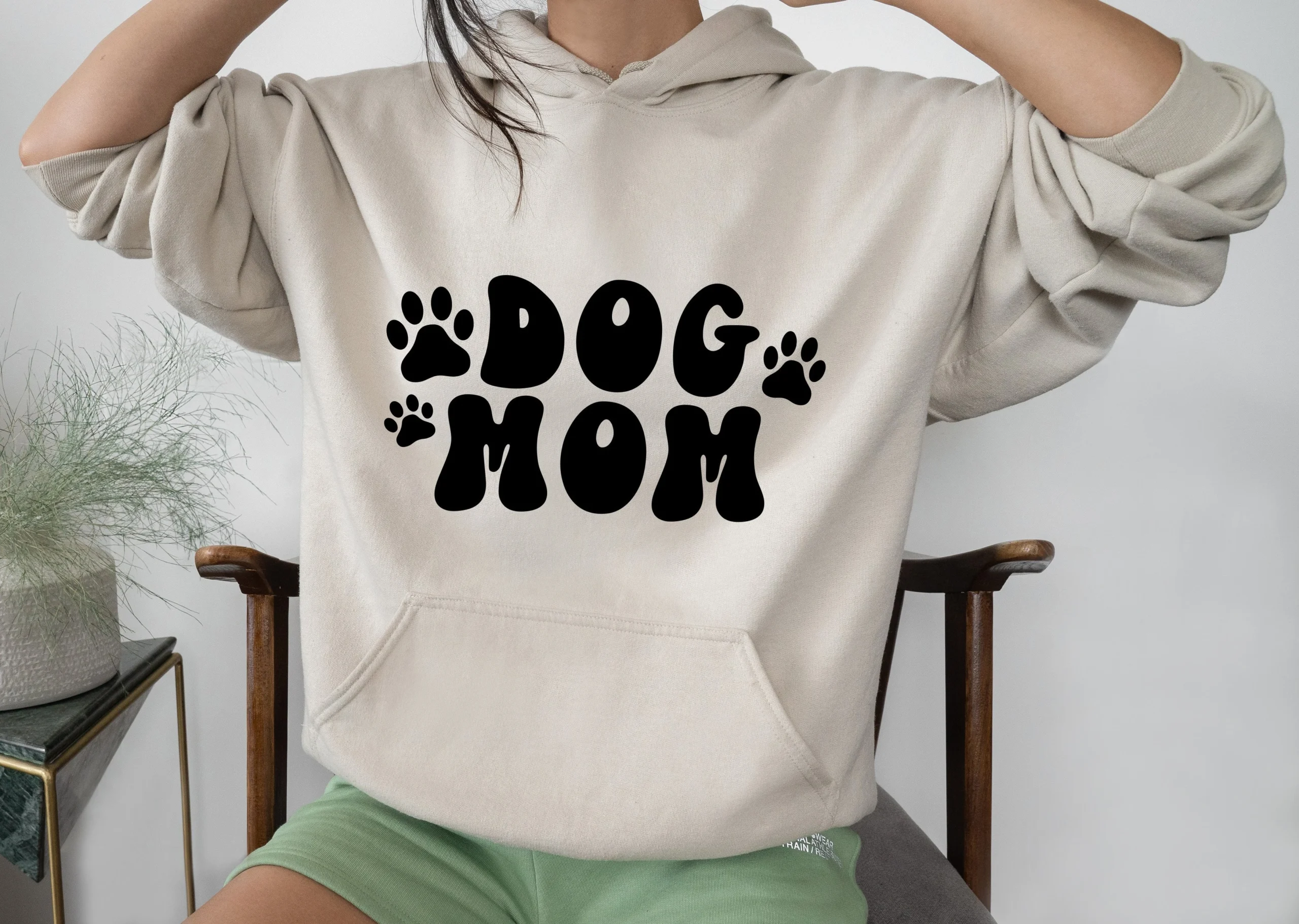 Dog Mom SVG - Retro Font featuring dog paw prints and paw print silhouettes
